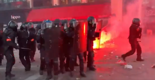 Chaos in Paris as thousands take to the streets today in protest ...